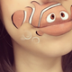 Illustration for article titled Girl transforms her mouth into cute famous characters with just makeup